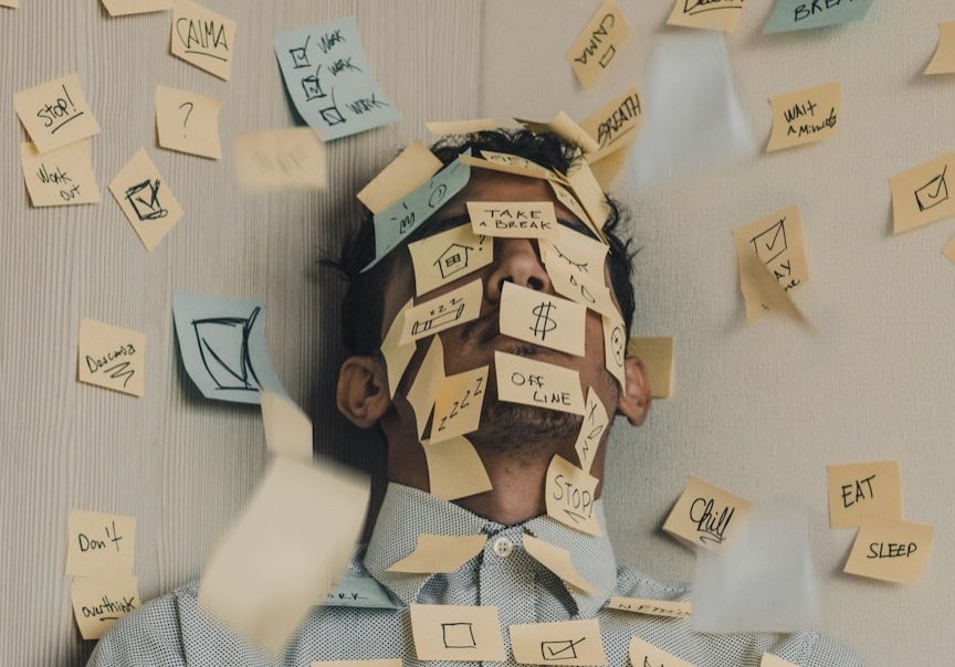 people sitting on chair with brown wooden table
